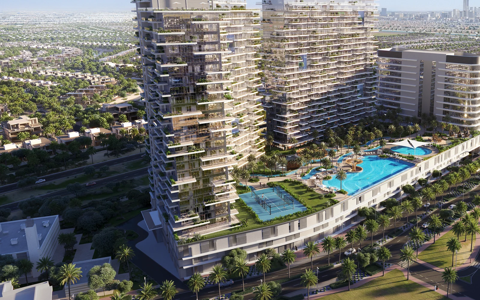 Dubai residential development with landscaped pool and apartment towers